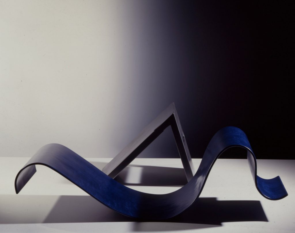 2 parts of chair lying seperated on the floor